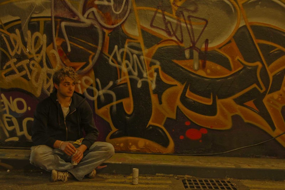 Damon in front of Graffiti-smaller.jpg